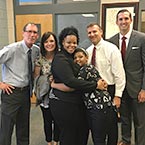 Mother and Daughter hugging and Some Kohlerackels employees